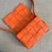 Bottega Veneta Cassette Bag In Orange Lambskin