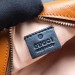 Gucci GG Marmont Mini Round Bag In Cognac Diagonal Leather